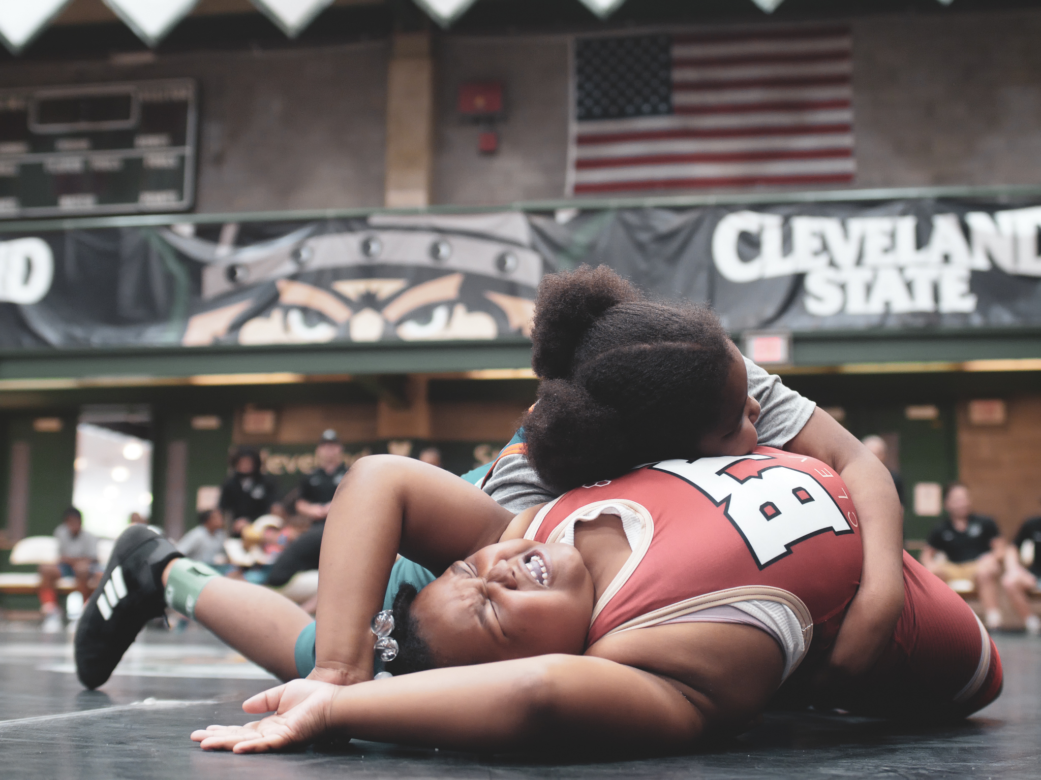 Youth wrestlers competing on the mat